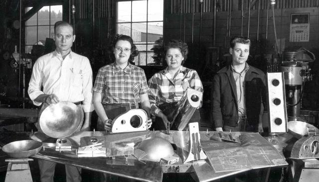 male and female aviation maintenance students in the 1940s