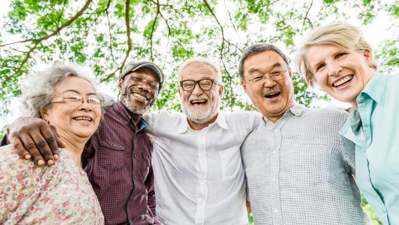 Five Senior Citizens smiling.
