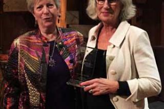 image of Board Chair Sharon Stiles (left) with President Mary Spilde