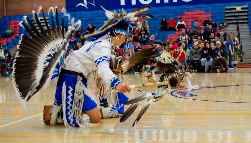 a pow wow dancer in the LCC gym