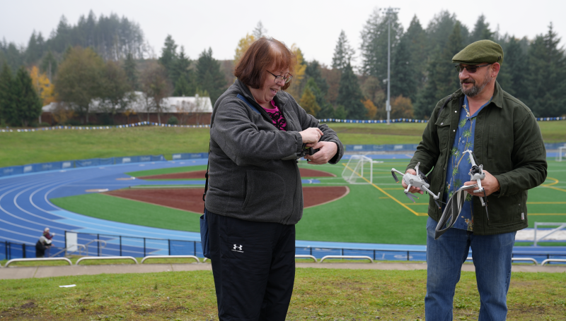 two UAS students talking and laughing