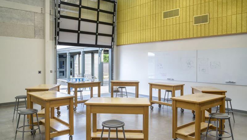 an art classroom in the Florence Center with a trendy garage door entrance