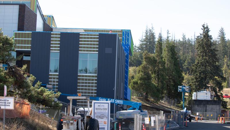Exterior of ITEC building viewed from the north with forest in the background