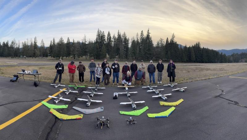 drone students posing with their drones at the rural Oakridge airport