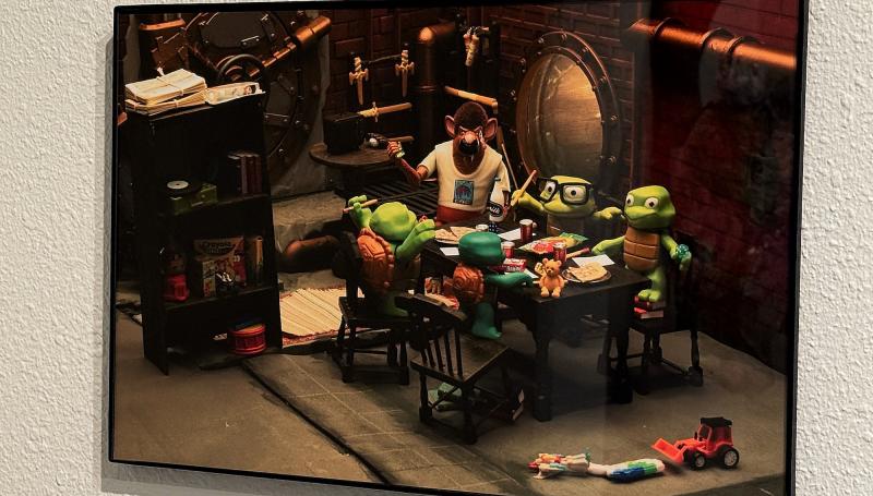a tableau of the Teenage Mutant Ninja Turtles as children playing Dungeons & Dragons with Splinter 