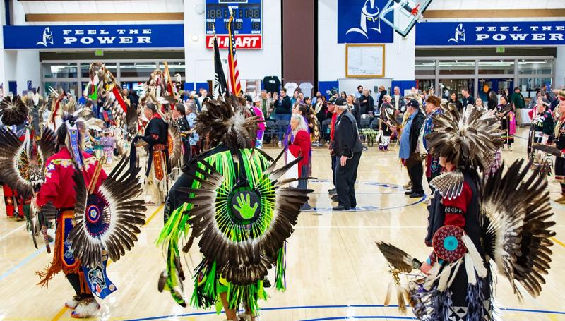 many dancers in full regalia at the 2019 LCC Pow Wow
