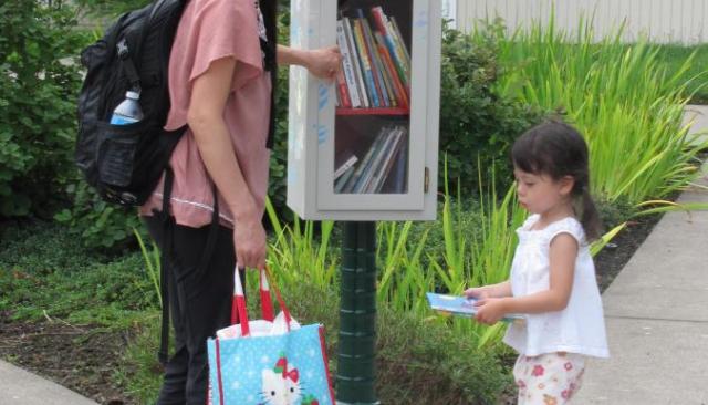 parent and child at little library