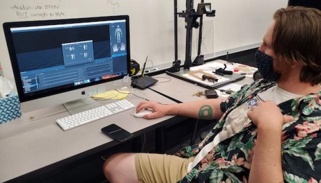 Animation Student working at a computer doing motion work