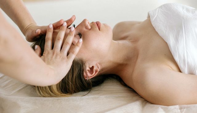 woman receiving a calming massage