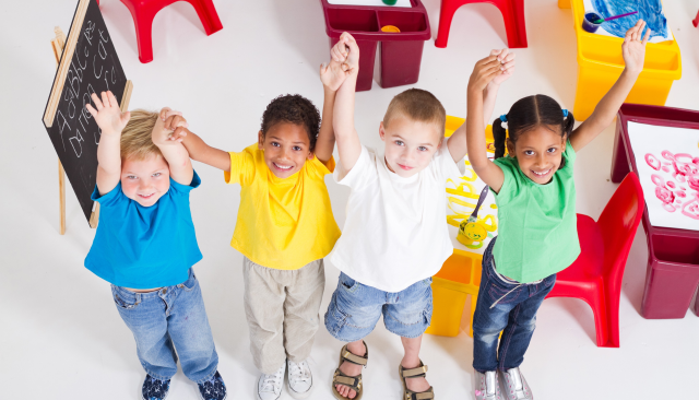 Four Preschool Children Smiling