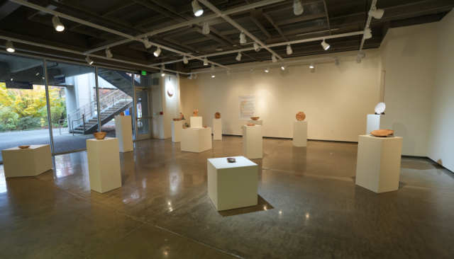 wooden art pieces on display at the LCC art gallery