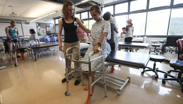 PTA student with a patient