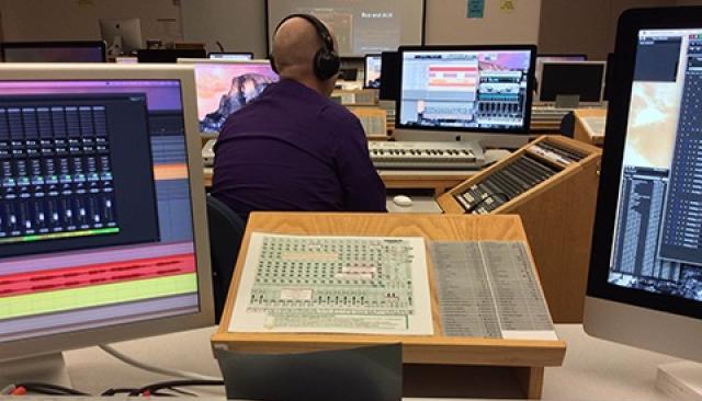 Person working in the Music technology lab on a computer