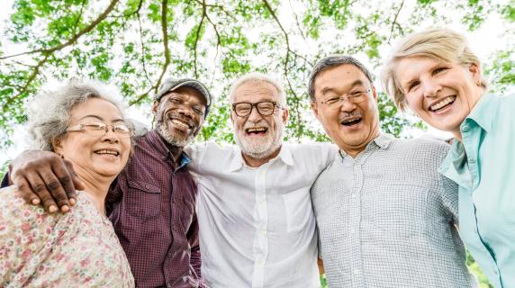 Five Senior Citizens smiling.