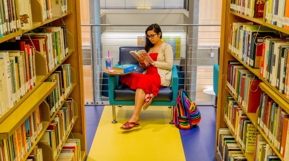 student studying in Library