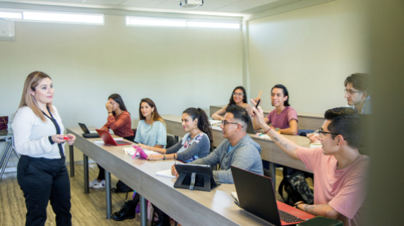 A college instructor teaching an engaged class