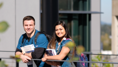 Two students standing outside