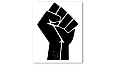 the black power fist with a small silhouette of the continent of Africa