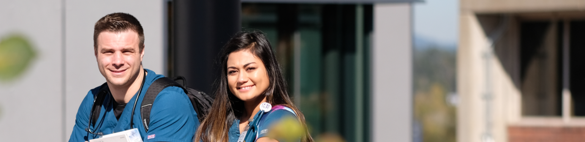 Two students standing outside