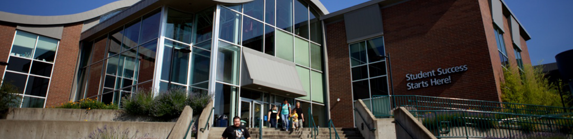A student leaving a building on campus