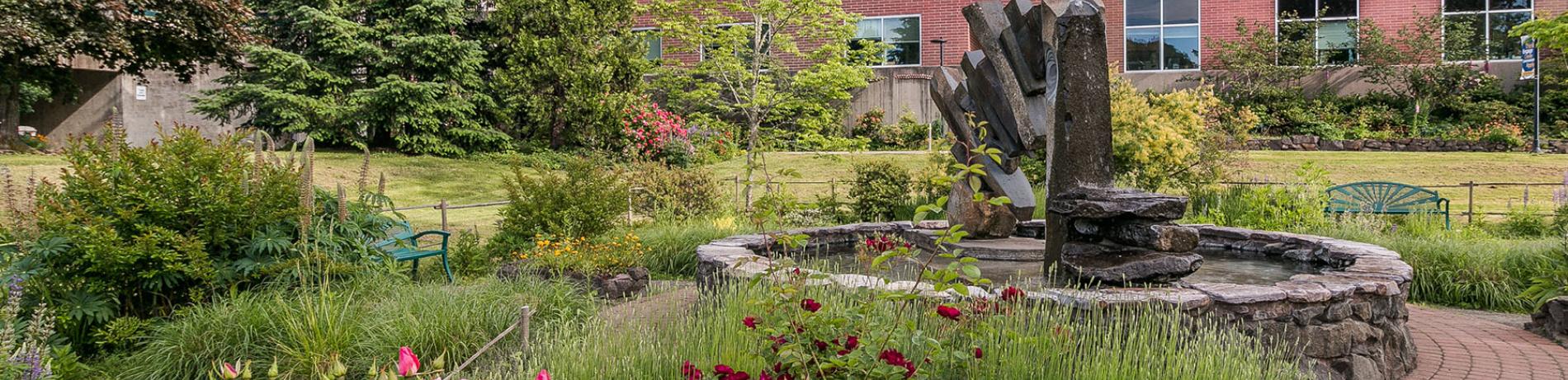 photo of main campus fountain and flowers