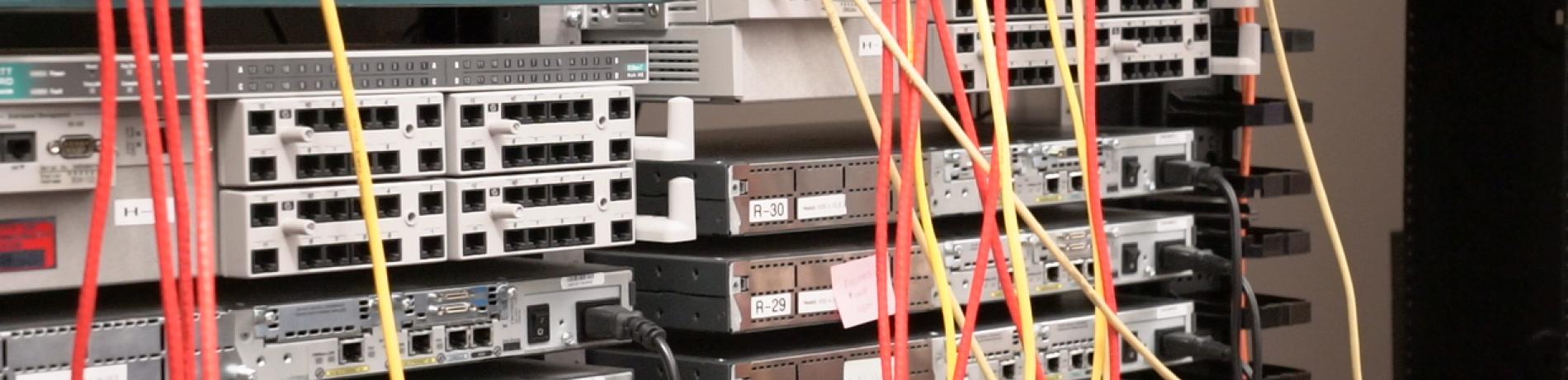 Hand reaching towards networking switches