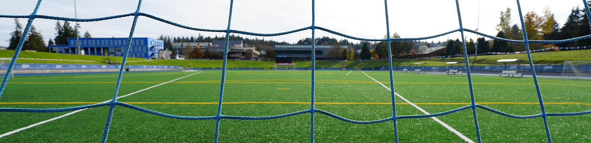 An LCC soccer field viewed from the goal net