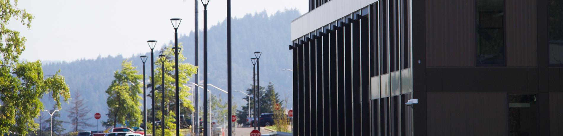a new building and the parking lot at LCC
