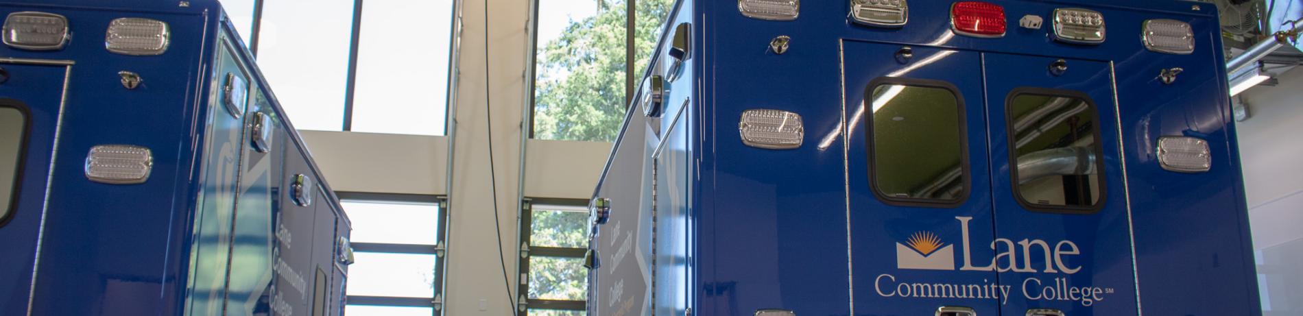 LCC ambulances for the EMS program parked in Building 32