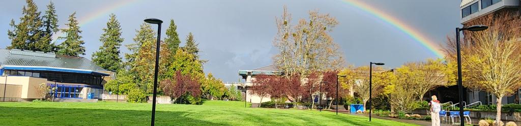 a rainbow over Bristow square on main campus after a rain spring day