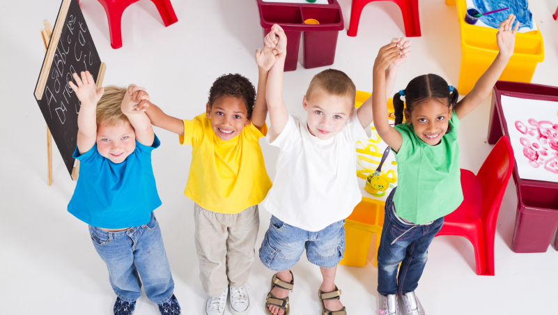 Four Preschool Children Smiling