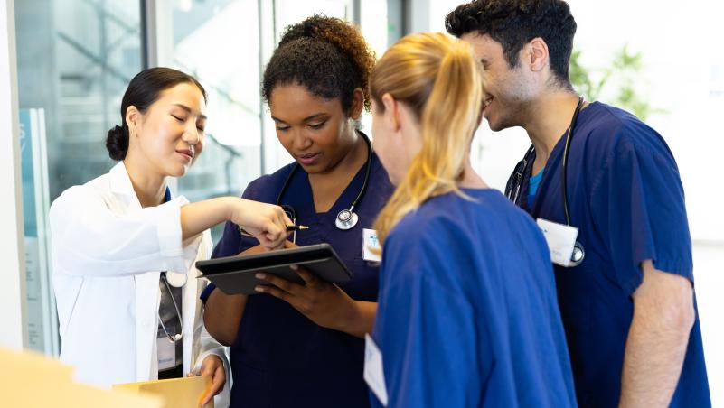 Four nursing students working together.