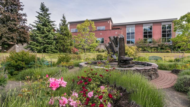 West Entrance Garden Fountain on Lane Community College's main campus with Building 1 in background