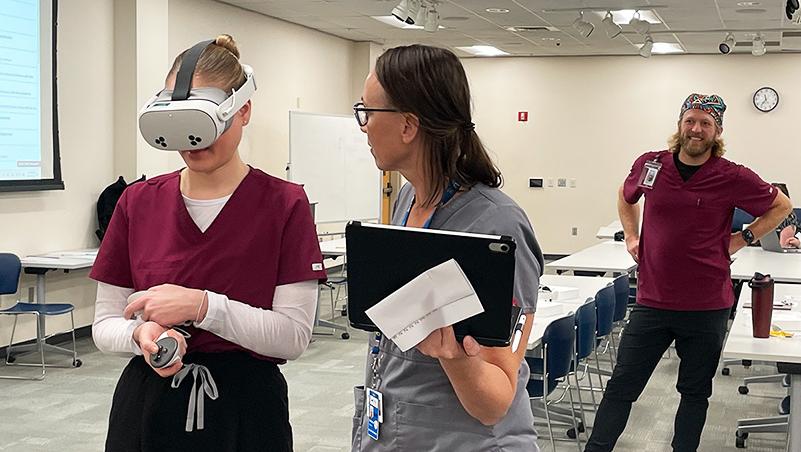 a Lane nursing instructor teaches her students clinical simulation with VR headsets