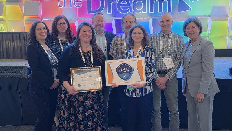 LCC Staff stands with ATD CEO Karen Stout after receiving Award