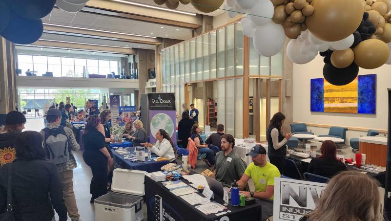 photo of tables and students at job fair