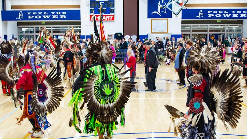 many dancers in full regalia at the 2019 LCC Pow Wow