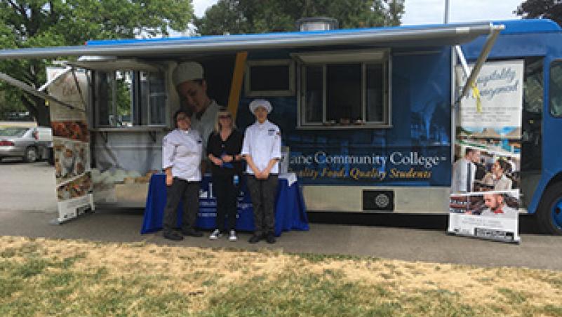 image of LCC Food Truck and three employees