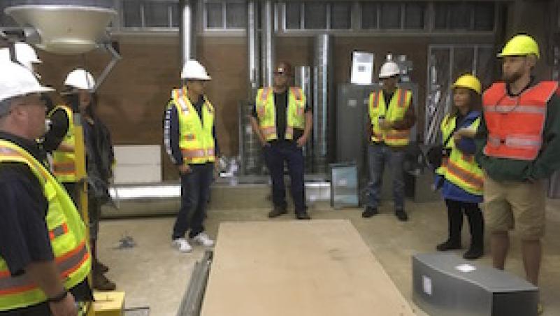 Drafting class visits seismic job site