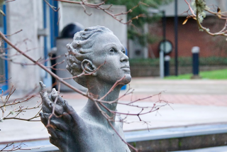 photo of art on campus, sculpture of woman's head