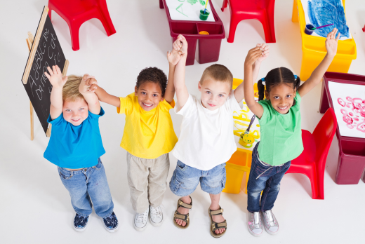 Four Preschool Children Smiling