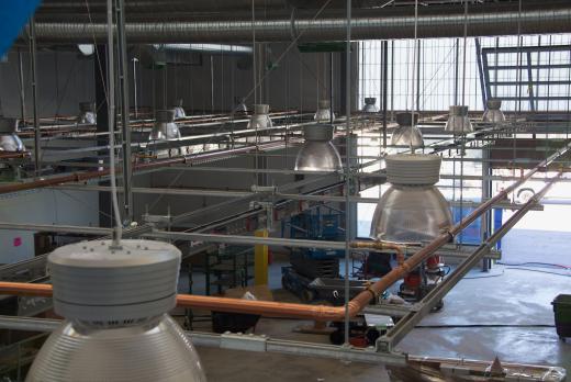 interior view of ITEC building show lights hanging over construction bay
