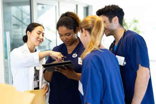 Four nursing students working together.