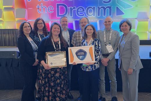 LCC Staff stands with ATD CEO Karen Stout after receiving Award