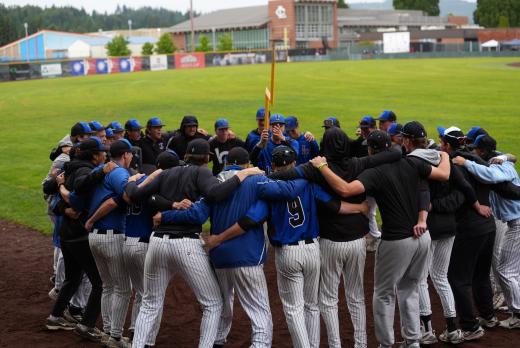 Titans baseball team huddle holding lightning strike symbol