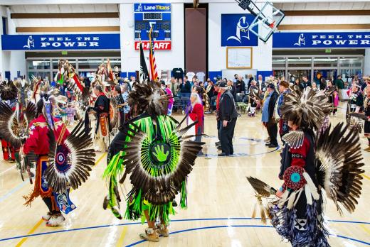 many dancers in full regalia at the 2019 LCC Pow Wow