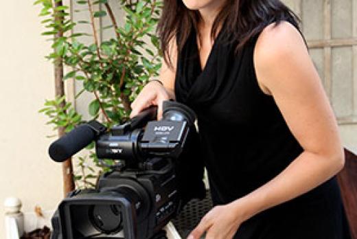 image of Laura Miller aside video camera