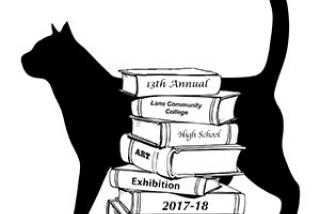image of book pile and cat