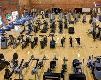 view of the first floor workout equipment taken from the second floor