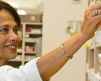 a pharmacy technician working after after completing her online training